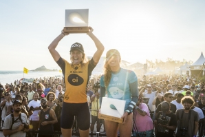 Caption: Six-time WSL Champion Stephanie Gilmore (AUS) and Lakey Peterson (USA) celebrate their success at the Oi Rio Pro.  Credit: © WSL /  Poullenot